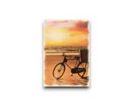 Ansichtkaart - Fiets op het strand met zondersondergang